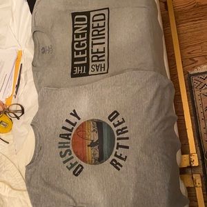 (2) new tee shirt w/retirement motto on front